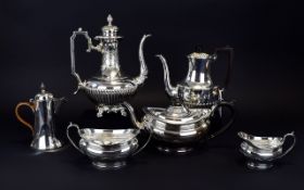 A Collection Of Late 19th And Early 20th Century EPNS Tea And Coffee Ware Six items in total,