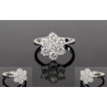 18ct White Gold Diamond Set Cluster Ring, In a Flower head Setting. Hallmark London 1975.