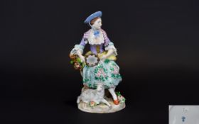 Sitzendorf Late 19th Century Hand Painted Porcelain Figurine of a Young Woman Musician Sitting on