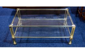 Lacquered Brass Two Tier Coffee Table with lower storage shelf. 15 inches high 36 by 21 inches high.