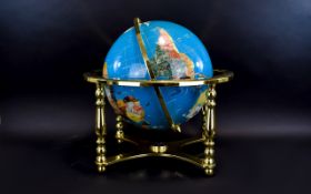 Decorative Gemstone Globe Gilt framed globe inlaid with various semi precious stones and gold tone