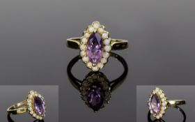 Ladies 9ct Gold Amethyst and Opal Dress Ring. The Marquise Cut Amethyst Surrounded by Opals.