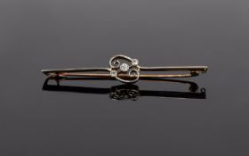 Ladies 15 Carat Gold and Platinum Bar Brooch. set to centre 3 old cut pavee set diamonds not