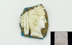 Early Roman White Paste Glass Cameo of the Roman Goddess of Agriculture, Ceres, with ribboned hair