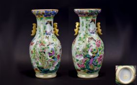 A Superb Quality 19th Century Chinese Enamel Twin Handle Vase.