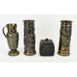 Three Pieces of Trench Art to include two in the form of vases and embossed jug. 10 and 9.