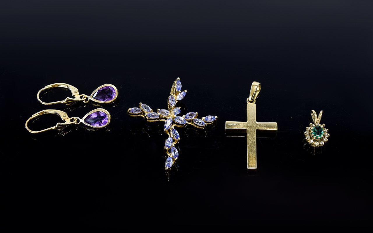 A Small Collection of 9ct Gold Hallmarked Jewellery. Includes 1/ 9ct Gold Cross Set with Amethysts.