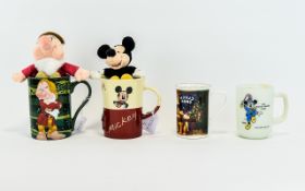 Collection of ( 4 ) Walt Disney Mugs.