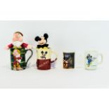 Collection of ( 4 ) Walt Disney Mugs.