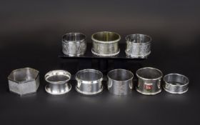 A Collection Of Mixed Metal Napkin Rings Nine in total of varying designs, one hallmarked, one EPNS,