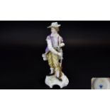 Karl Ens Fine Hand Painted Early 20th Century Porcelain Figurine of a Young Hunter with Rifle and