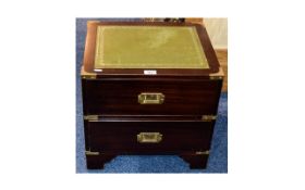 Modern Campaign Style Chest with 2 drawers with leather writing top and brass strap work to handles.