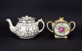A Sadler Ceramic Twin Handle Caddy Circular lidded vessel with twin side handles and central floral