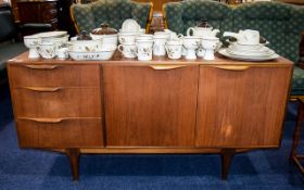 G Plan Teak Sideboard with three side drawers with cupboard space below. Raised on short legs.