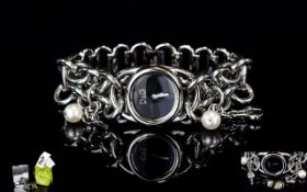 Ladies Contemporary Fashion Watch By D&G Silver tone chunky bracelet watch with black dial and