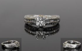 Fine Quality White 18ct Gold Set Single Stone Princess Cut Diamond Ring with Diamond Shoulders.