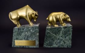 Wall Street Bull And Bear Brass Figures Two brass figures in the form of the bull and the bear,