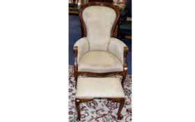 Victorian Spoon Back Armchair with upholstered back rest and seat, with short cabriole legs.