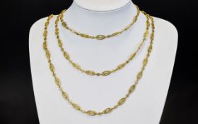 A Very Fine 18ct Gold Ornate and Open Worked Long Chain.