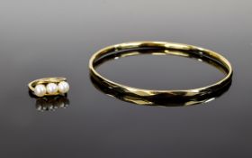 Ladies 9ct Gold Bangle And Pearl Set Ring An attractive thin gold bangle with faceted design.