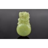 Antique Period Chinese Yellow Jade Boy and Drum Pendant, of Very Fine Quality and Proportions.