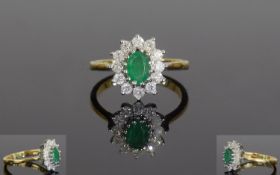 18ct Gold Emerald And Diamond Ring, Set With A Central Oval Emerald Surrounded By Round Modern