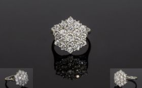 18ct White Gold Fine Diamond Cluster Ring. Flowerhead setting. Comprises of 19 Brilliant Cut