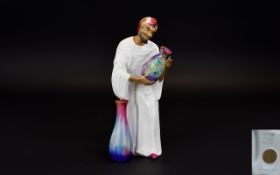 Richton Studies Handmade and Painted Porcelain Figure ' Pot Seller ' Height 8.5 Inches.