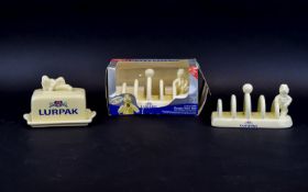 Three Lurpak Items to include toast racks and butter dish ( the cover A/F)