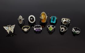 A Collection of Silver Stone Set Dress Rings.
