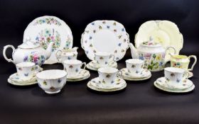 A Mixed Collection Of Ceramic Serve Ware And Tea Sets Twenty seven items in total to include Crown