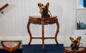 A Decorative Console Table Small crescent shaped table with trefoil legs,