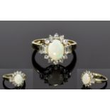 Ladies 9ct Gold Set Baguette Brilliant Cut Diamond and Opal Cluster Ring. Fully Hallmarked. 3 grams.