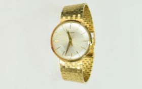 Bulova - Mechanical Gents 9ct Yellow Gold Watch with a 9ct Gold Integral Mesh Bracelet.