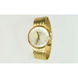 Bulova - Mechanical Gents 9ct Yellow Gold Watch with a 9ct Gold Integral Mesh Bracelet.