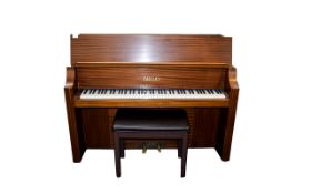 Russell and Russel Limited Upright Piano, mahogany case. With piano stool.