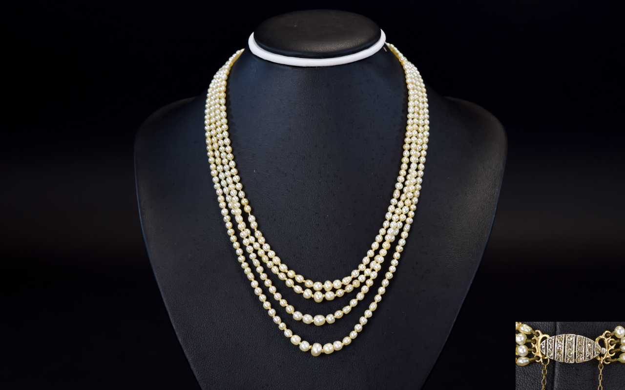 19th Century Period Very Fine 4 Strand Natural Pearl Necklace with a Gold Clasp and Safety Chain,