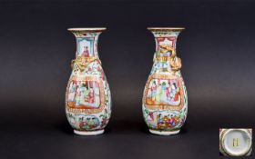 Chinese Pair of 19th Century Famile Rose Vases with Painted Figures In an Interior Scene within