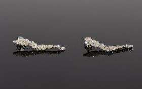 Diamond Articulated Drop Earrings, in the style of stalactites, comprising .