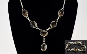 A Modern Large Impressive and Heavy Topaz Set - Sterling Silver Necklace with Matching Bracelet.