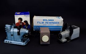 A Collection of Vintage Projectors including Elmo Fim Rewinder, Polaroid Impulse, Kodak Retina IIIS,