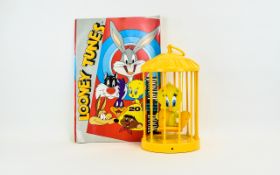 Looney Tunes Collectables. Includes Tweetie Pie Swinging In a Cage + Looney Tunes Poster Book,