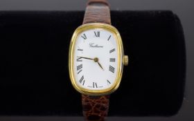 A Gold Plated ' Guillaume ' Ladies Wrist Watch - Swiss Made ( Manual Wind ) on a Leather Strap In a