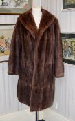 Vintage Mid Length Musquash Coat Ladies shawl collar coat in pale brown mink with side seam pockets,