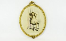 A Framed Sepia Tone And Hand Tinted Portrait Of A Young Girl Housed in oval gilt frame ,