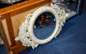 Decorative Reproduction Oval Bevelled Glass Mirror Housed in an impressive reproduction frame with