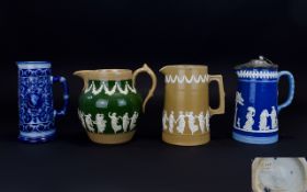 Four Various English Late 19thC Jugs comprising a Copeland late Spode wide bodied, dark green jug