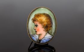 Victorian Period Silver Gilt Oval Shaped Painted Portrait Brooch of a Young Person.