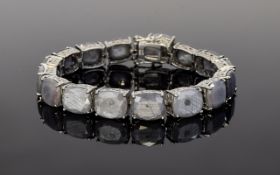 Natural Silver Sapphire Tennis Bracelet, over 100cts of natural silver sapphire, cushion cut over