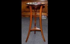 Mahogany Circular Side Table with tripod base and under shelf with inlaid detail, 28 inches high.